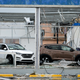 A Puerto Rican car dealership lies in tatters. (Image: AP)